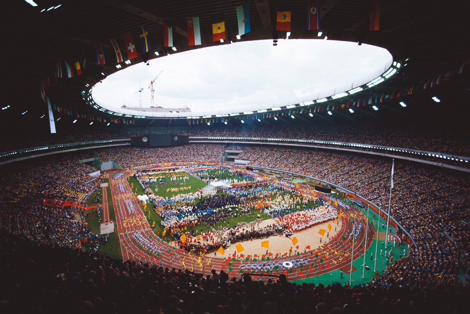 Opening Ceremony for 1976 Olympics Athletes parade around the track at Olympic Stadium during the opening ceremony for the 1976 Summer Olympic Games.