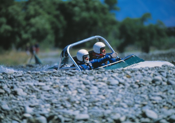 51_Waitaki_13 The labyrinthine braided channels of the lower Waitaki offer plenty of challenge to jetboat enthusiasts. Sprinters (above) compete in time trials over a course the size of a football field, while river racers charge up and down long stretches of river, seeking the fastest route among the tortuous braids, and reaching speeds of 160 km/h. The engines, some of them developing 1000 hp, can burn 10-20 litres of fuel per minute.